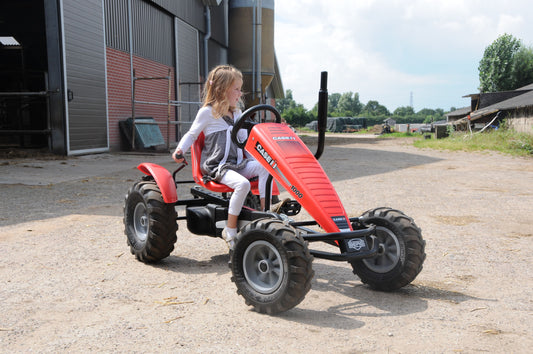 Outdoor farm play with BERG Case Tractor pedal tractor