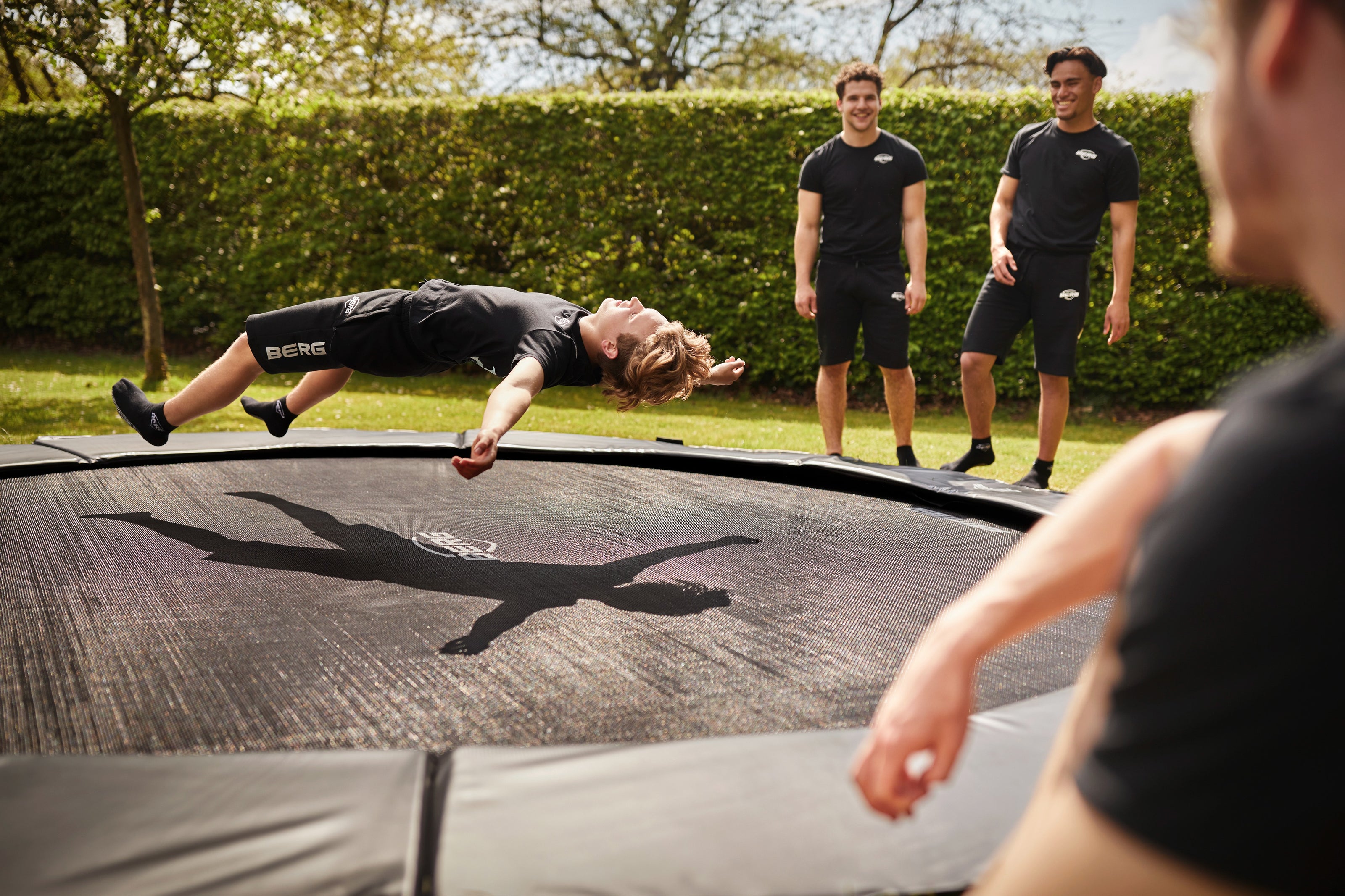 teen jumping on BERG Champion FlatGround trampoline