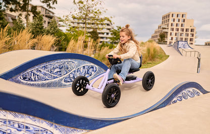 kids playing outside with BERG Buddy Purple go kart active outdoor play and fun