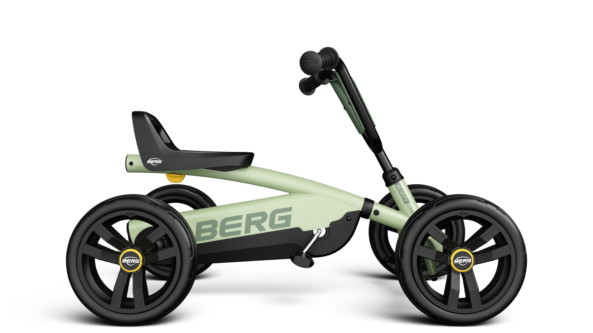 Side angle of the BERG Buzzy Green ride-on go-kart with adjustable steering wheel