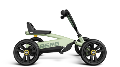 Side angle of the BERG Buzzy Green ride-on go-kart with adjustable steering wheel