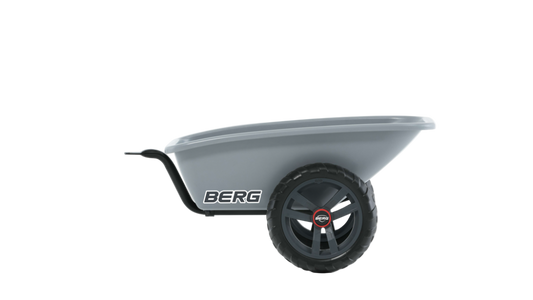 Close-up of BERG Buzzy Trailer S wheel and towbar