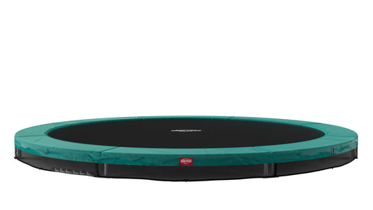 Kids enjoying BERG Favorit InGround trampoline outdoor play