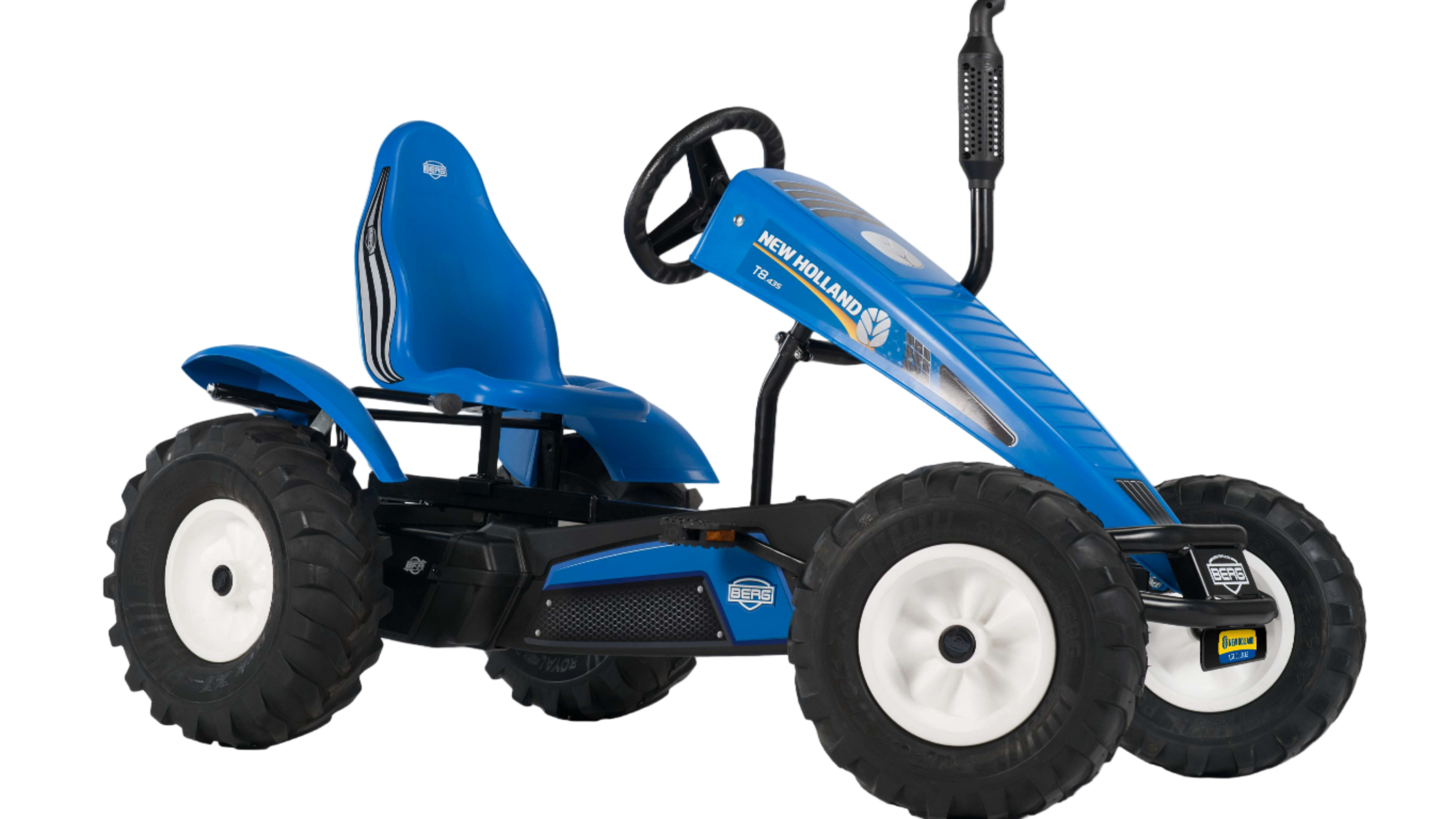 Outdoor farm play with BERG New Holland pedal tractor