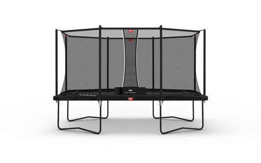 Child jumping on BERG Ultim Favorit Regular rectangular trampoline